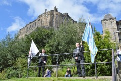 2021 Captain Elect Jay Sturgeon carrying City of Banner and Gordon Rutter carrying Blue Blanket