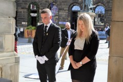 2021 Captain and Lass Elect, Jay Sturgeon and Abbie McDowall lay a wreath at the City Chambers War Memorial